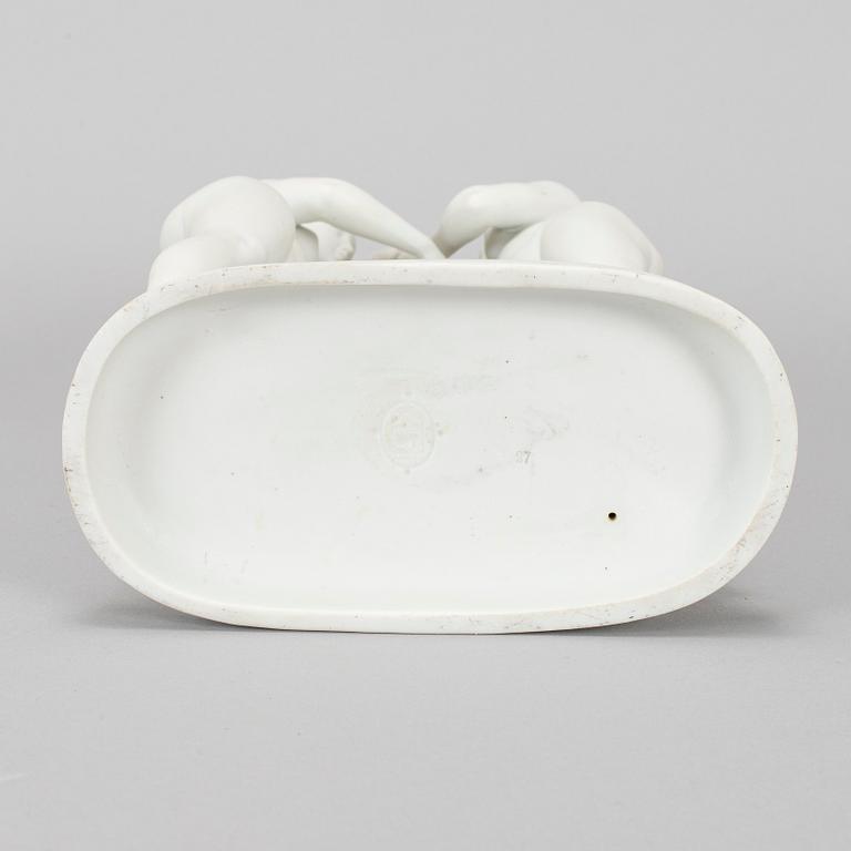 A porcelain figurine, Three Graces.