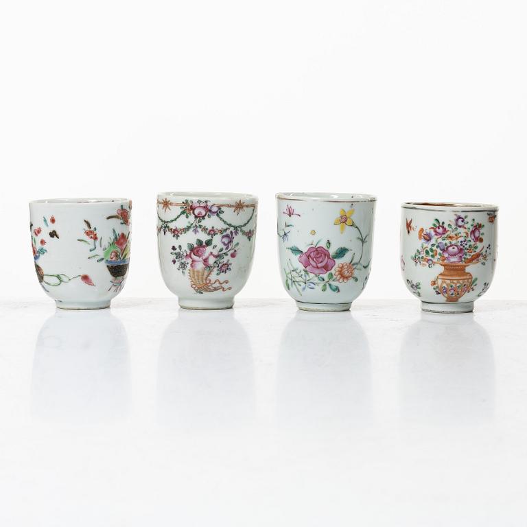 A group of 12 famille rose cups, Qing dynasty, Qianlong (1736-95).