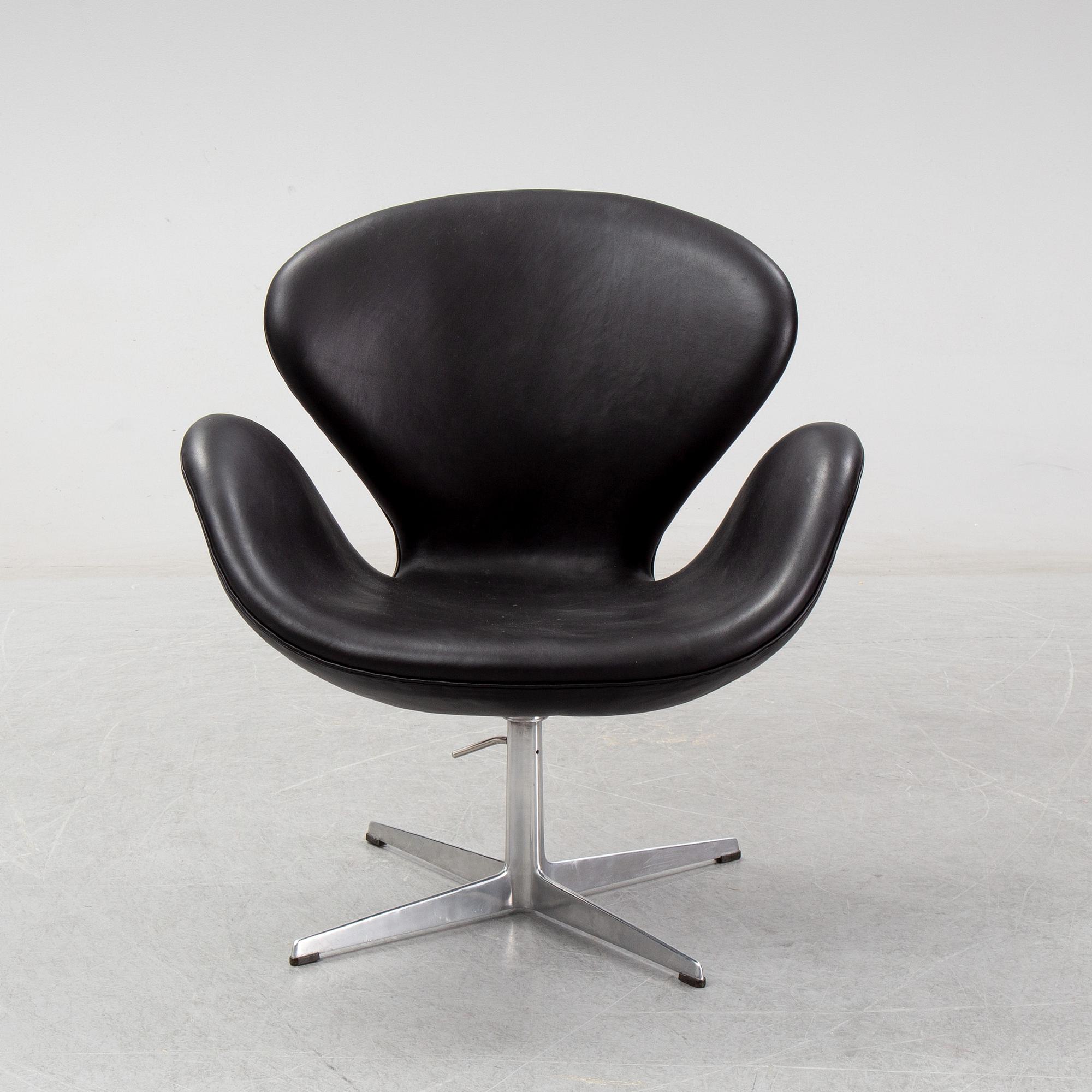 Arne Jacobsen, a black leather 'Swan' chair, Fritz Hansen, Denmark, 1967.
