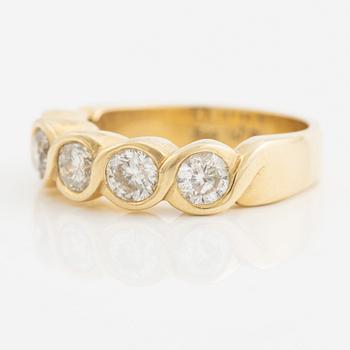 Ring, 14K gold with five brilliant-cut diamonds.