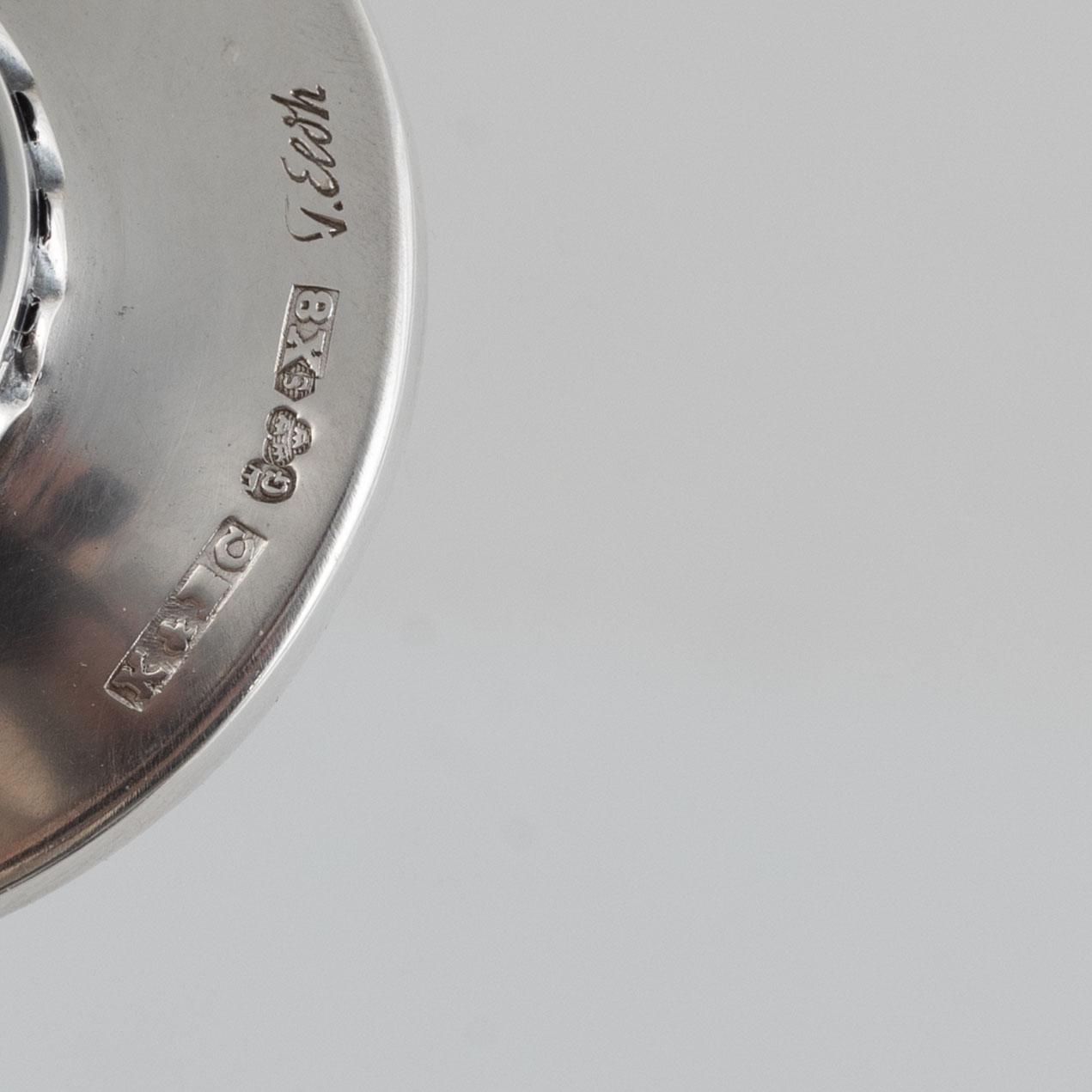 A silver candlestick, a beaker and a vase, including Gustaf Janson, CG Hallberg, Stockholm 1960.