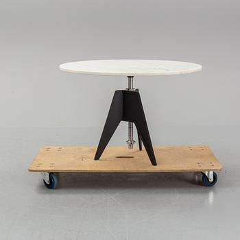 A Tom Dixon Screw Café Table.