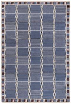 296. Barbro Nilsson, a carpet, 'Salerno blå med enkel bård', flat weave, c. 365 x 244 cm, signed AB MMF BN.