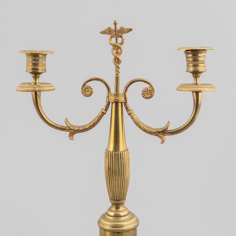 A pair of brass candelabra, first half/mid 19th century.