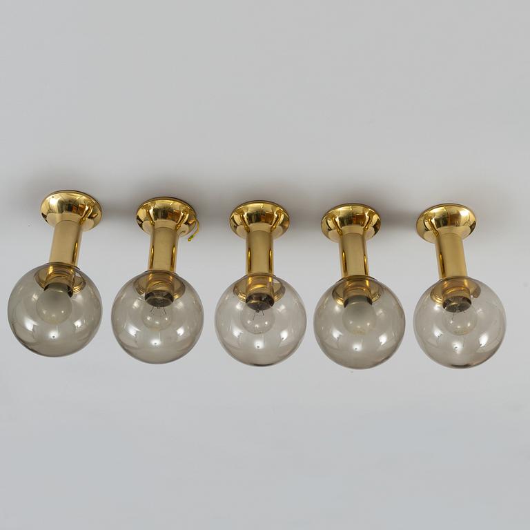 Five 1970's brass and glass ceiling/table lamps, Ott international.