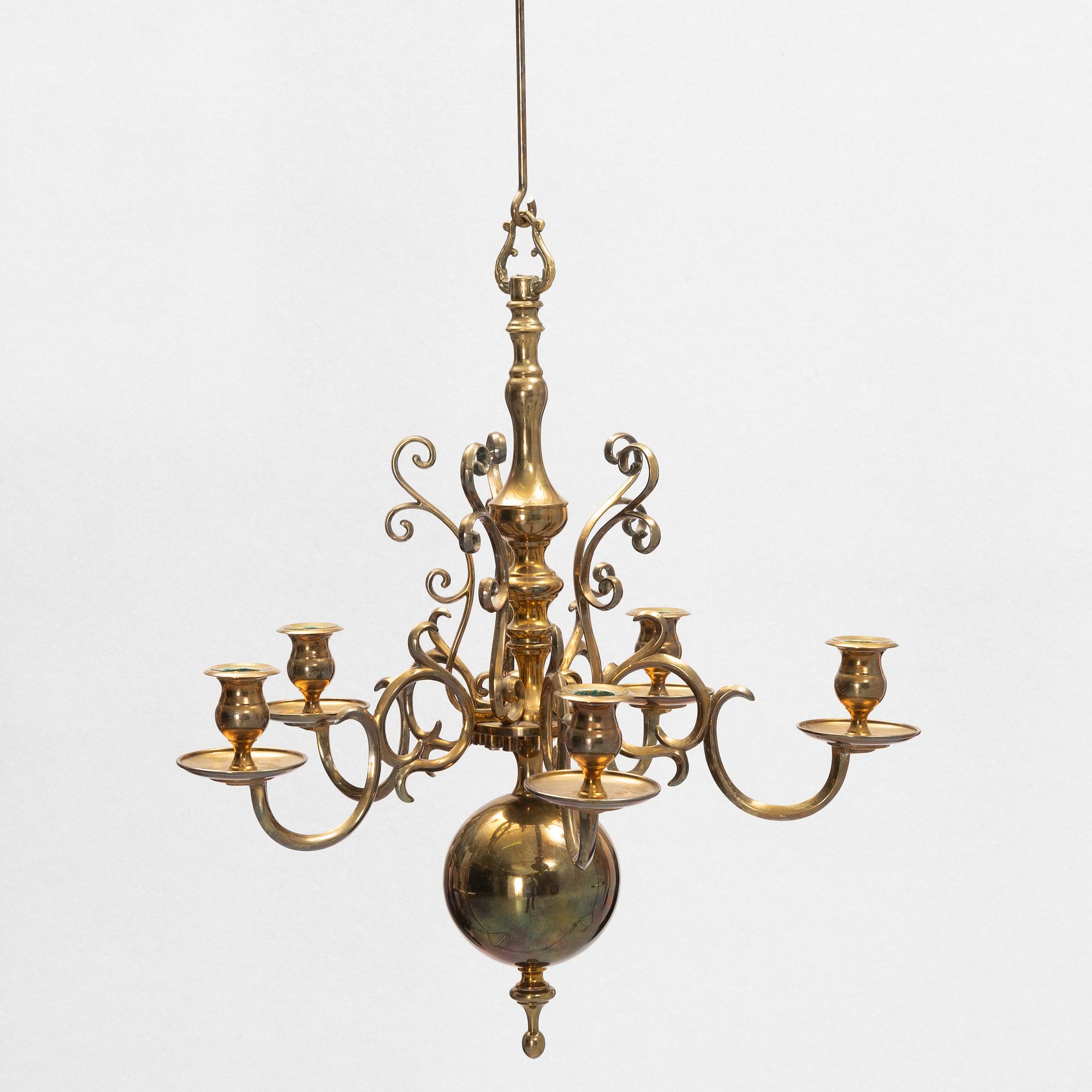 A brass chandelier, no 205, Skultuna Bruk, Sweden.