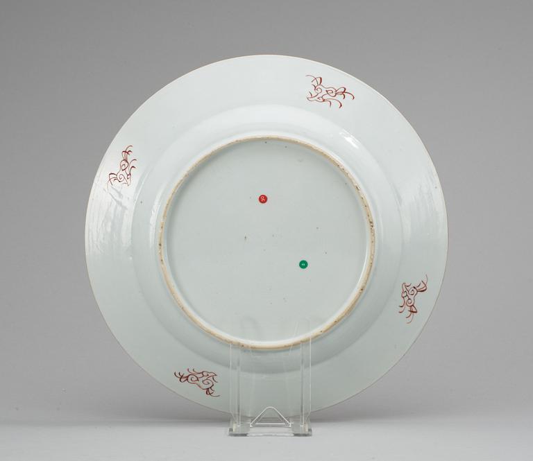 A polychrome plate, Qing dynasty (Qianlong 1736-95) .
