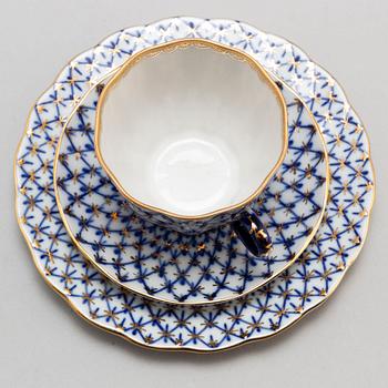 A 33-piece 'Cobalt net' porcelain coffee service from Lomonosov, Russia.