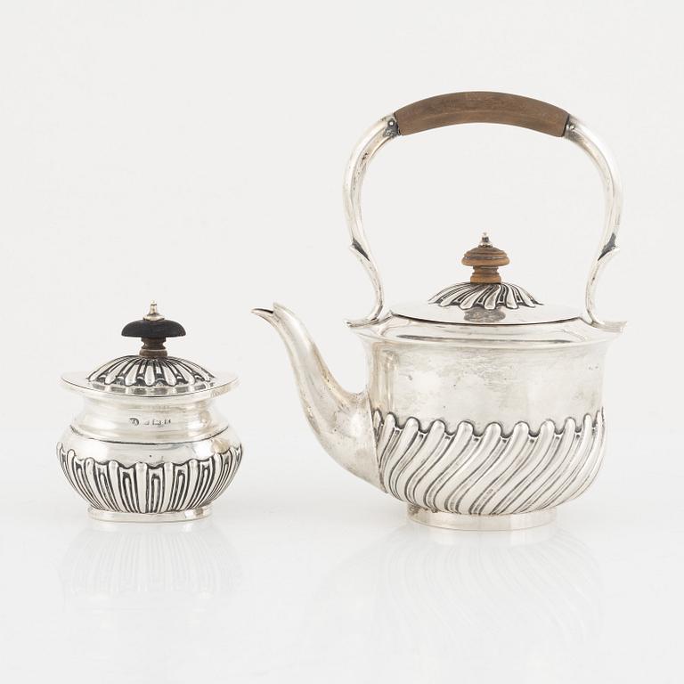 A silver coffee pot and a sugarbowl, including John Aldwinckle & Thomas Slater, London, England, 1844.