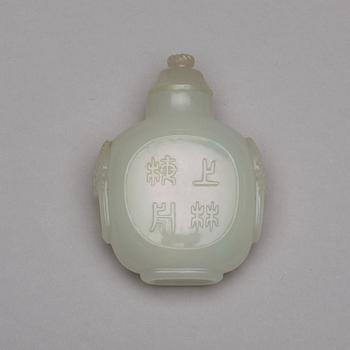 A Chinese nephrite snuff bottle, pendant and figurine.