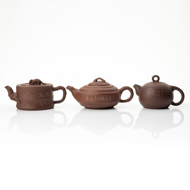 A group of three Chinese yixing teapots, 1960-80s.