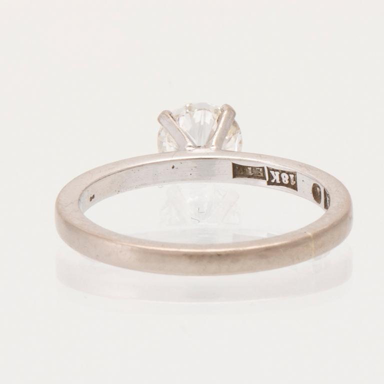 An 18K white gold solitaire ring set with a round brilliant cut diamond by Sten Eklund Stockholm 1979.
