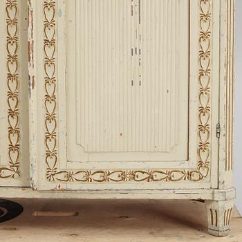 A late Gustavian cabinet, early 19th century.