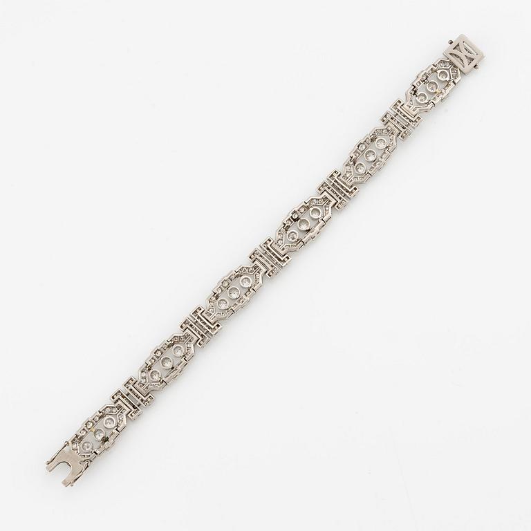 A platinum bracelet with round brilliant-and eight-cut diamonds.