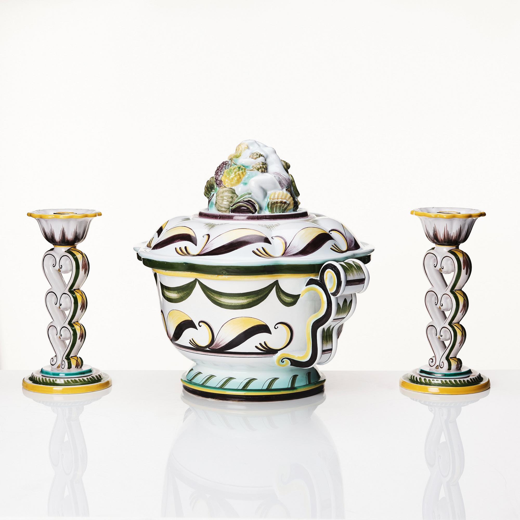 Arthur Percy, a Swedish Grace  lidded faience bowl and a pair of candlesticks,  Gefle Porslinsfabrik 1920s-1930s.