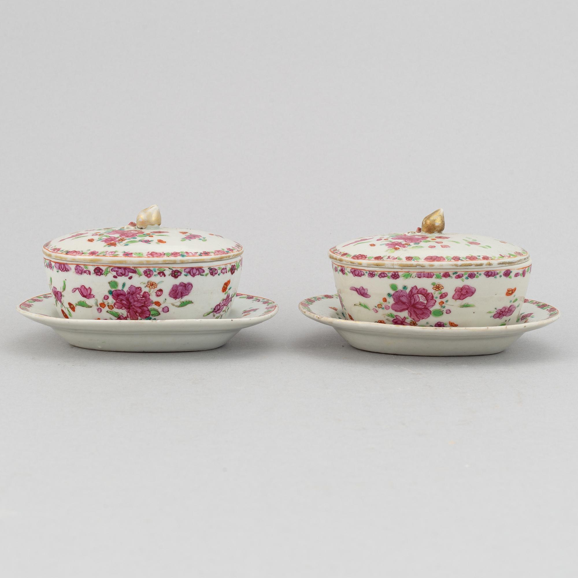 A pair of famille rose export porcelain butter tureens with dishes and covers, Qing dynasty, Qianlong (1736-95).