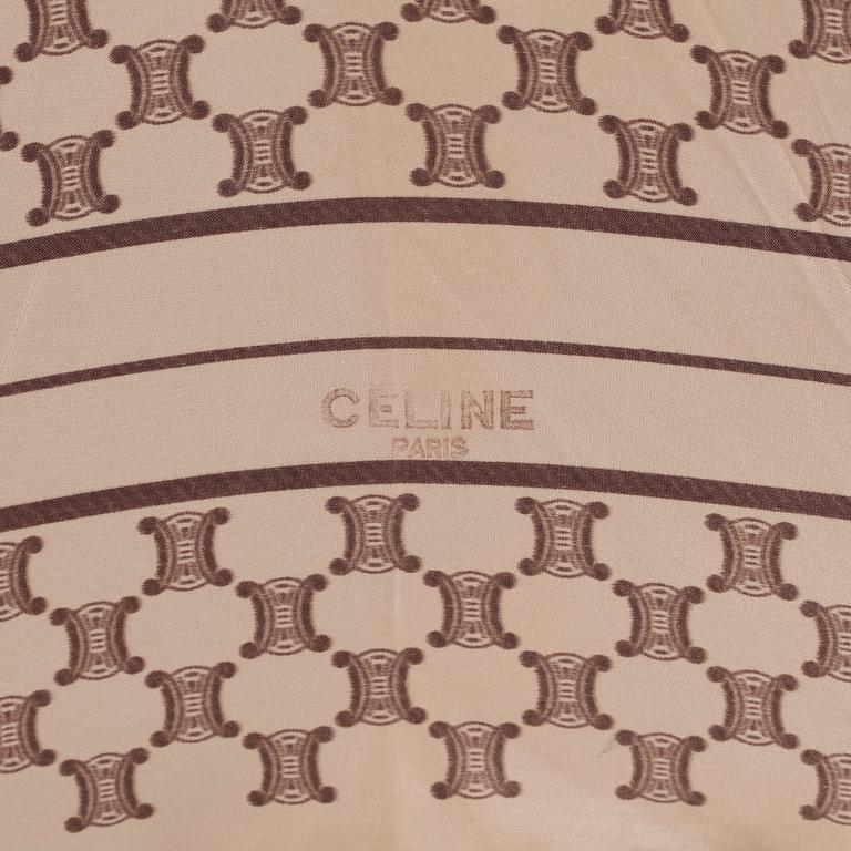 CÉLINE, a beige monogram umbrella.