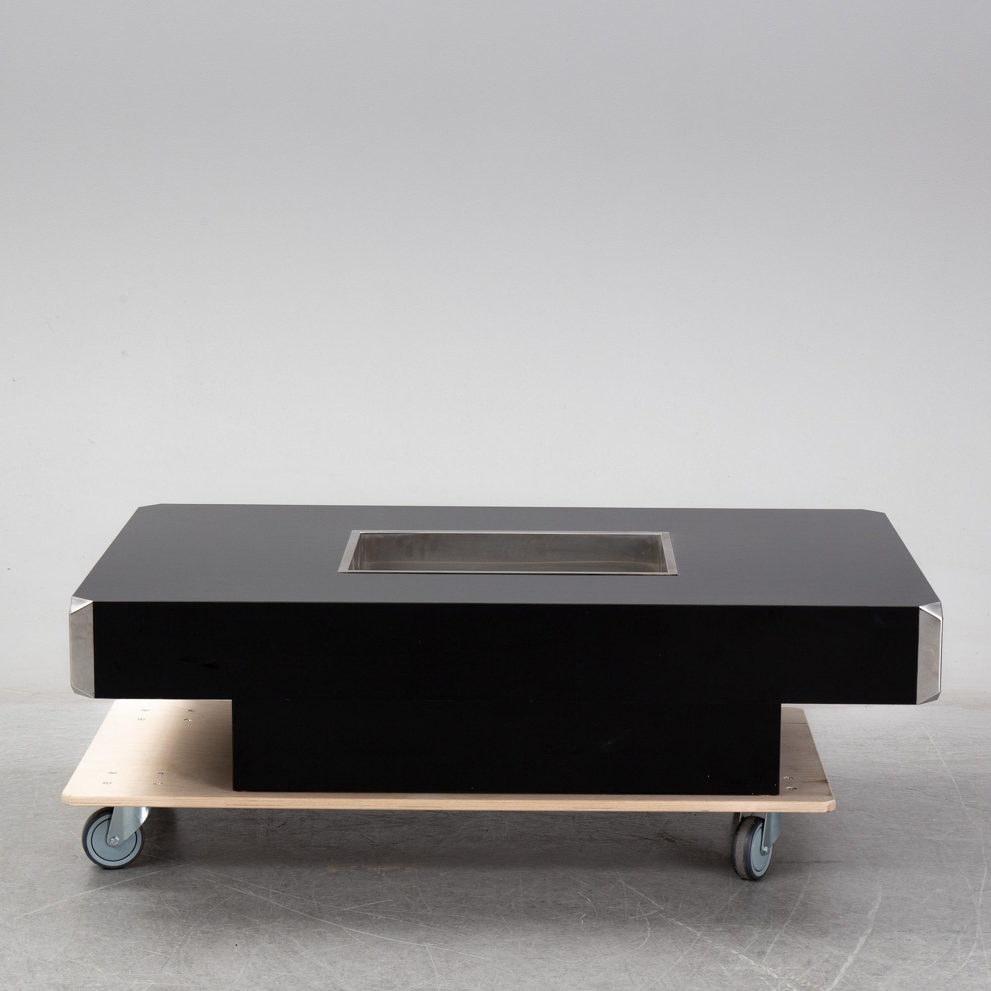 WILLY RIZZO, a black and chrome coffee table, second half of the 20th Century.