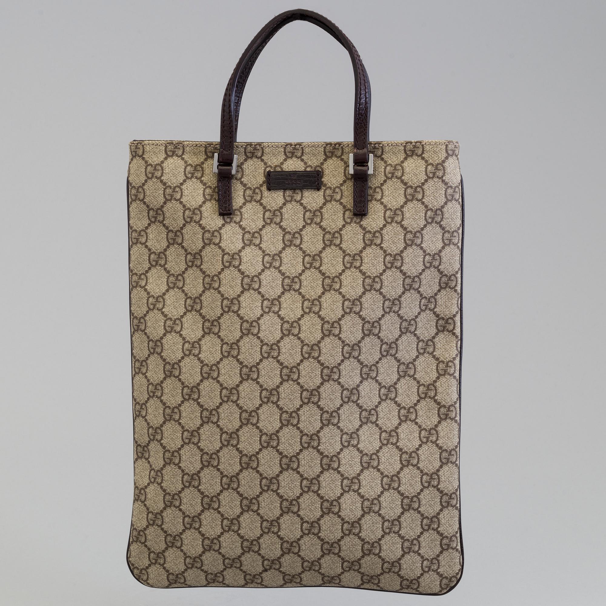 GUCCISSIMA PVC TOTE BAG BY GUCCI.