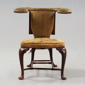 An English 18th century reading and writing chair.