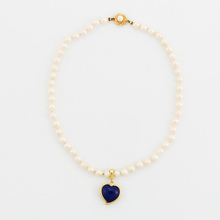 Cultured pearl necklace, with heart shaped charm.