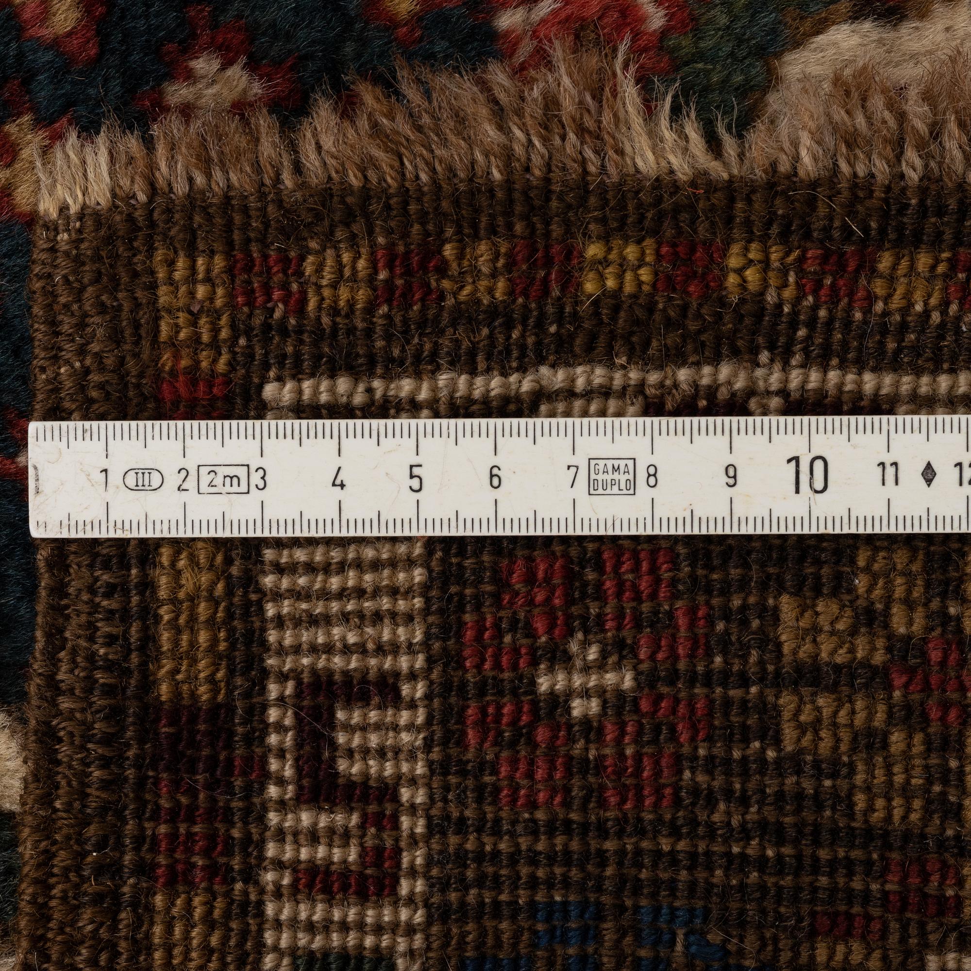 An antique Shahsavan, probably from the Moghan area ca 293 x 124 cm.