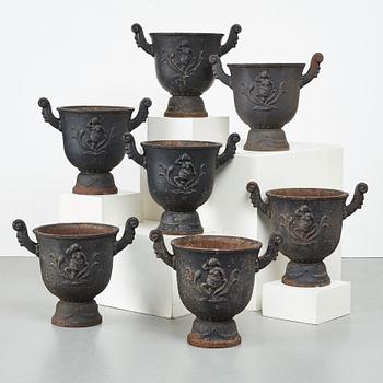 Ivar Johnsson, a set of seven Swedish Grace black painted cast iron jardenieres by Näfveqvarns Bruk, Sweden.