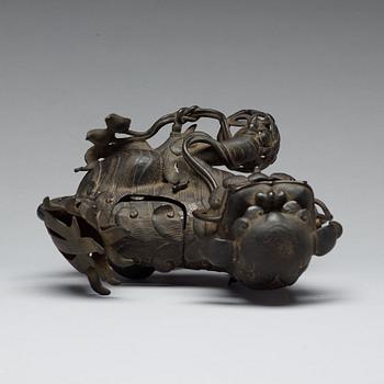 A bronze censer with cover in the shape of a Buddhist lion, Qing dynasty, 19th Century.