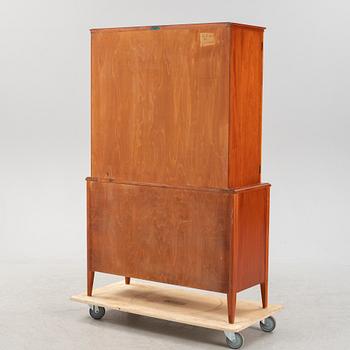 A mahogany veneered cabinet, Ferdinand Lundquist, Gothenburg, mid 20th Century.