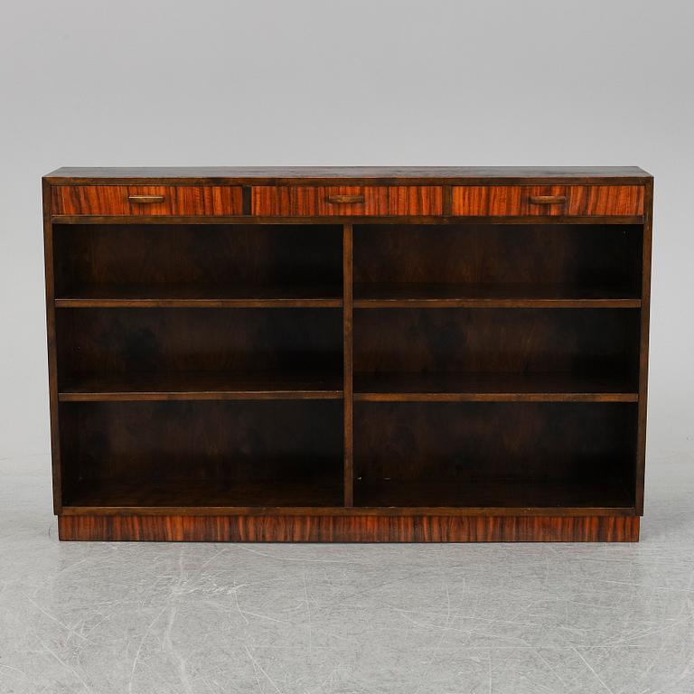 A 1930's stained birch bookshelf.