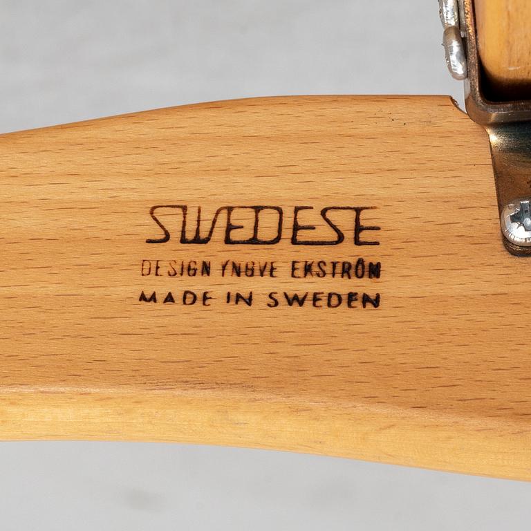 A pair of Laminett Yngve Ekström chairs.