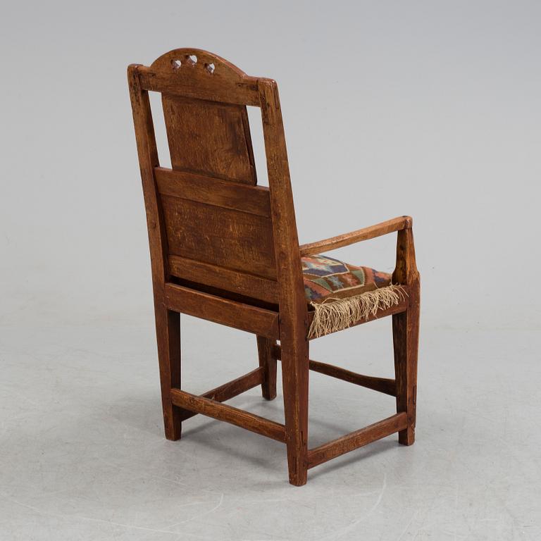 A 19th century folk art armchair.