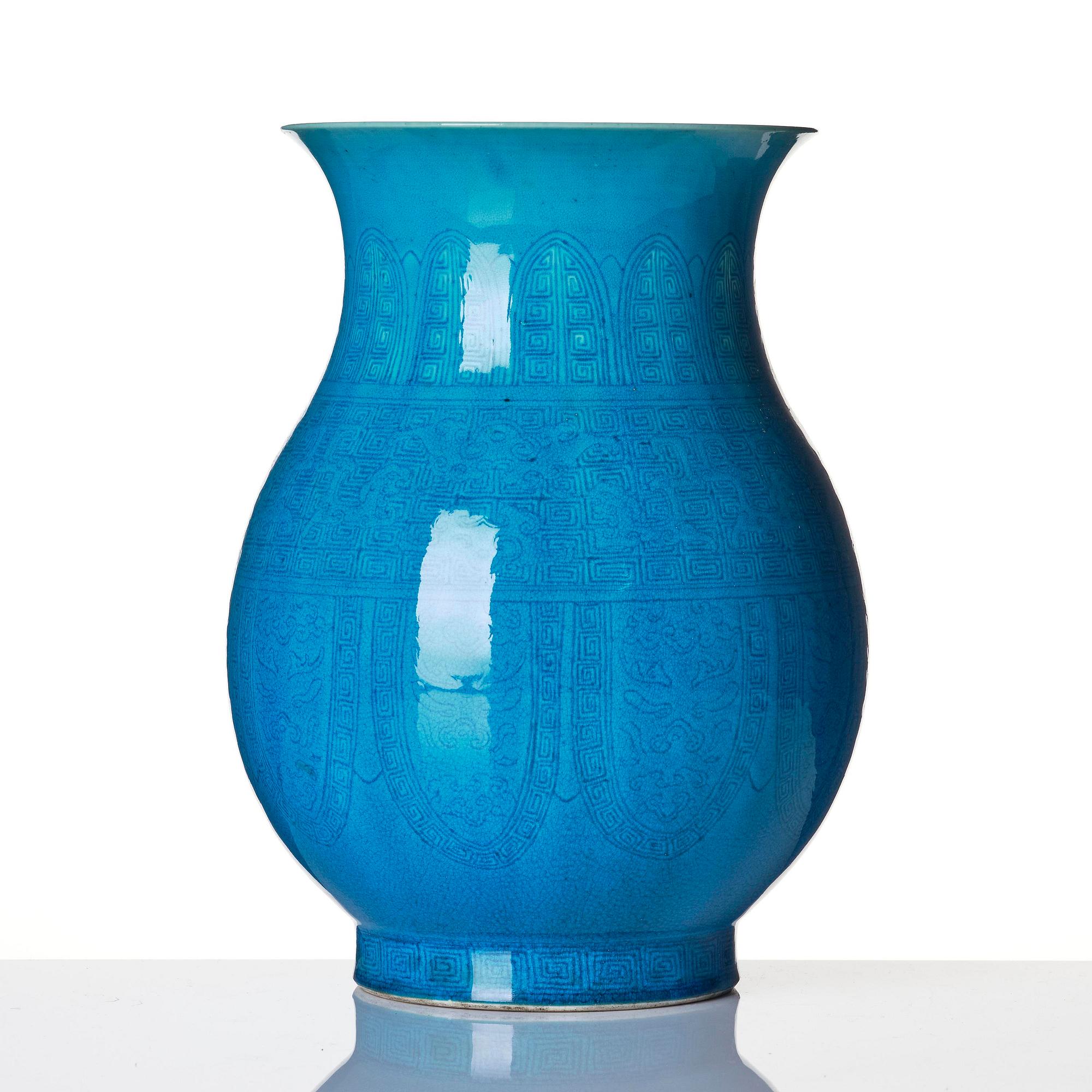 A turquoise glazed vase, zun, Qing dynasty with a Qianlong incised seal mark and of the period.