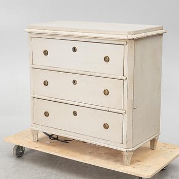 A chest of drawers, around 1900.