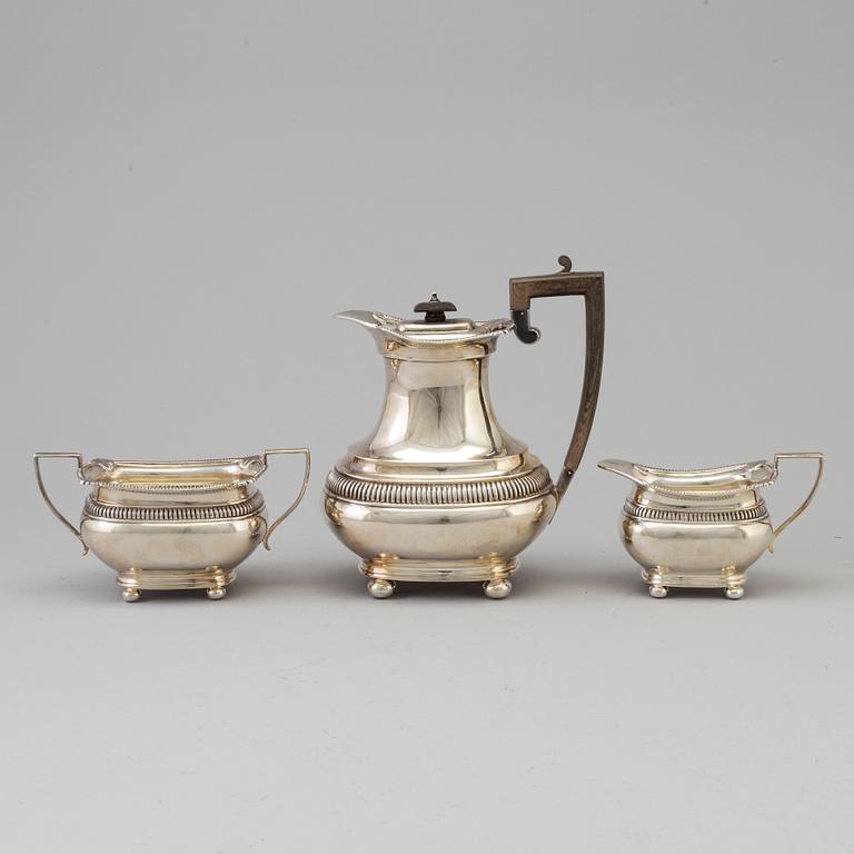 A three piece silver coffee set by The Alex Clark Company, London, first half of the 20th century.