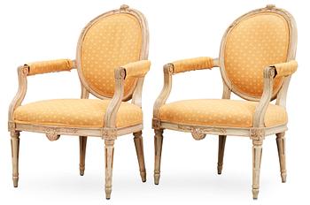 674. A pair of Gustavian late 18th century armchairs.