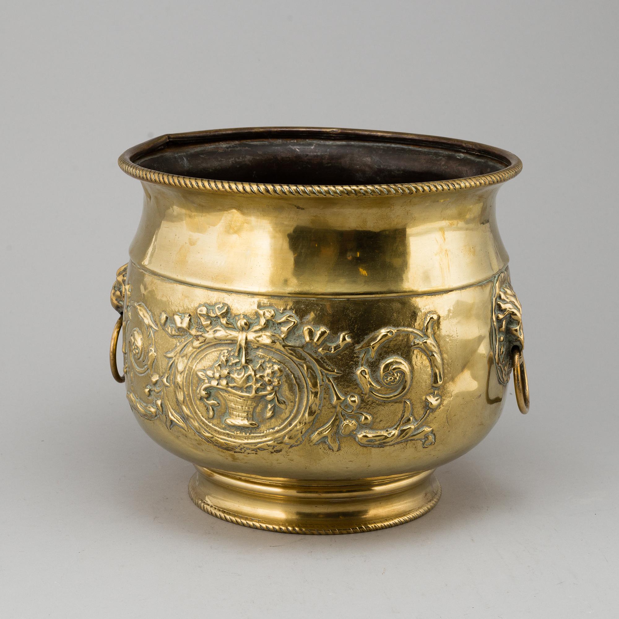 An 18th/19th century brass flower pot.