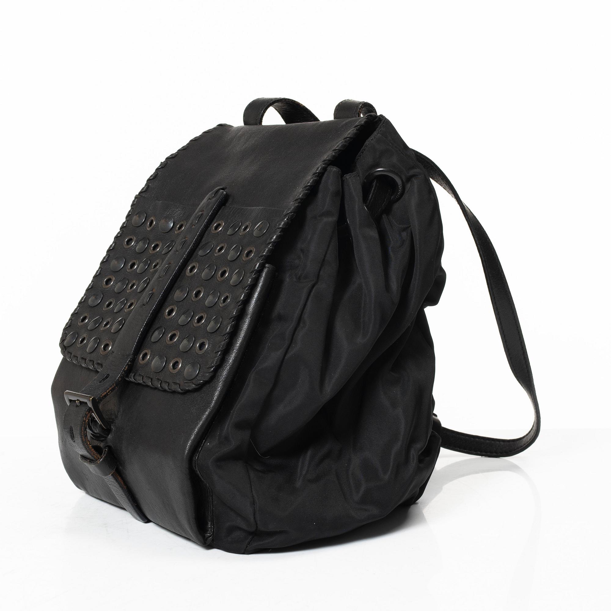 Prada, A nylon and leather backpack.