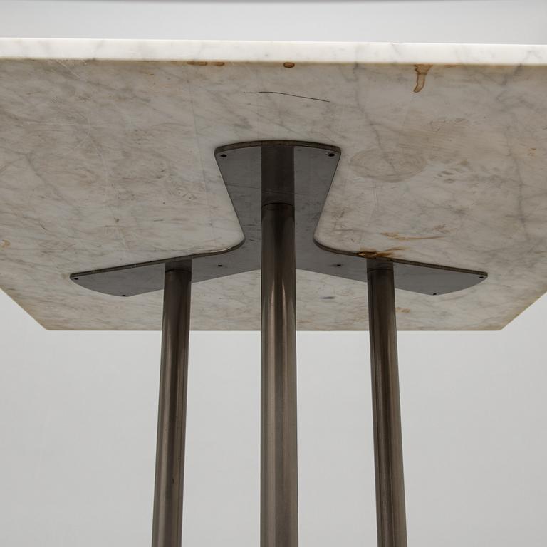A marble top table, 21th century.