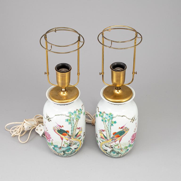 A pair of Chinese famille rose vases, turned into table lamps, 20th century.