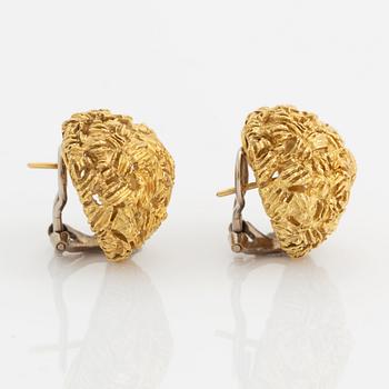 A pair of 18K gold earrings.