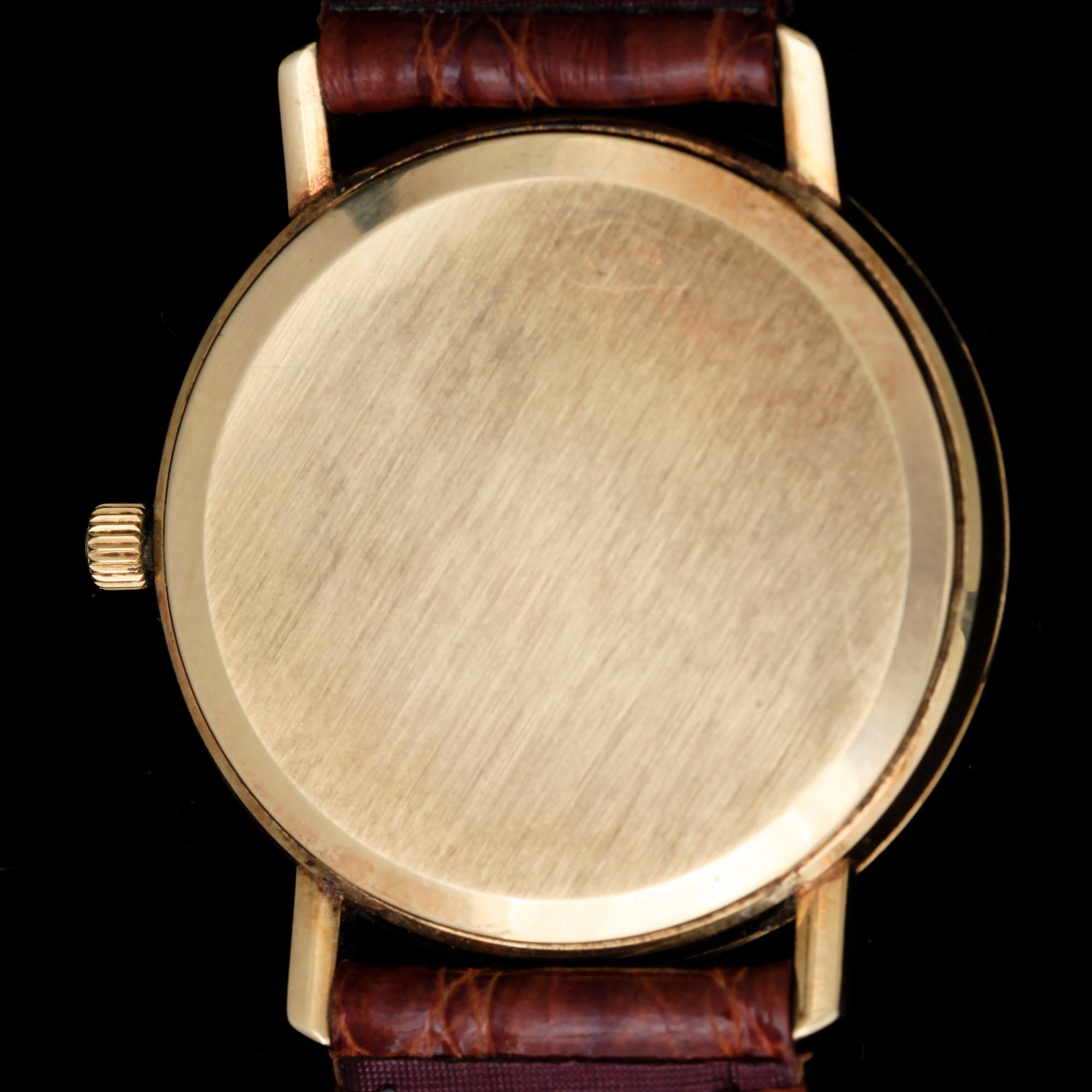 HERRARMBANDSUR, Omega, Genève, 14k guld, 1970-talets första hälft.