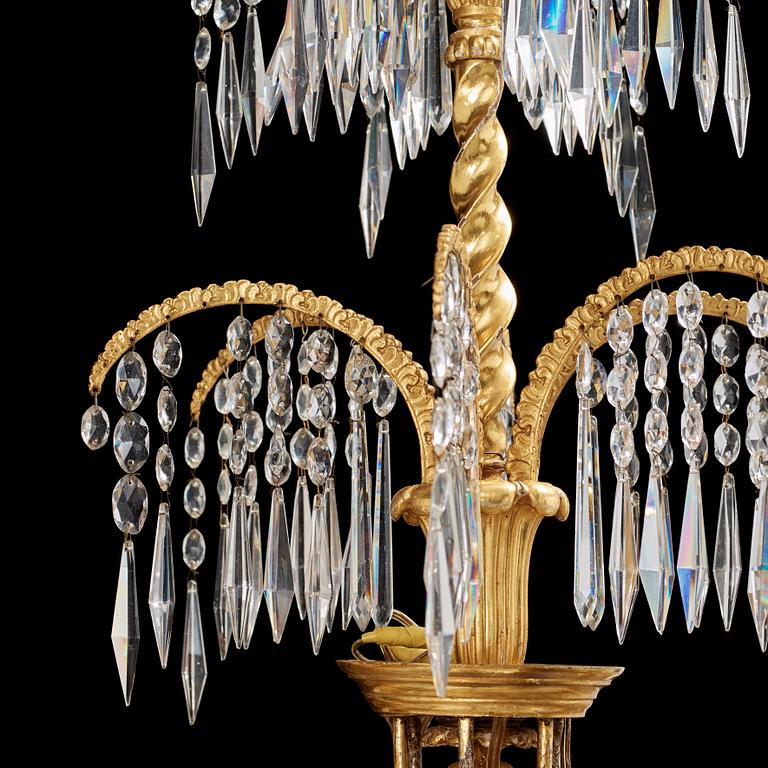 A German 19th century six-light chandelier in the manner of Karl Friedrich Schinkel.