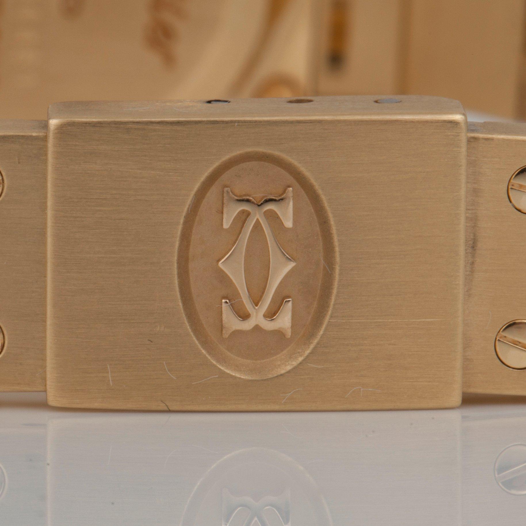 DAMUR, Cartier Santos, boett samt integrerad länk i 18K guld. Automat. Serienummer: 8090604461.