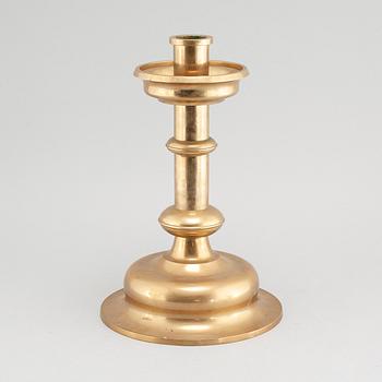 A brass candlestick by Erik Jonsson, Skara from the second half of the 20th century.