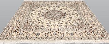 A Nain part silk carpet, c. 207 x 208 cm.
