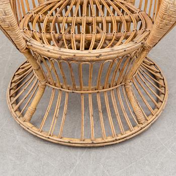 a rattan chair by Gio Ponti & Lio Carminati, Italy, second half of the 20th century.