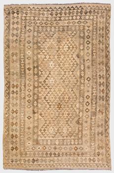 A Kilim carpet, ca. 305 x 196 cm.