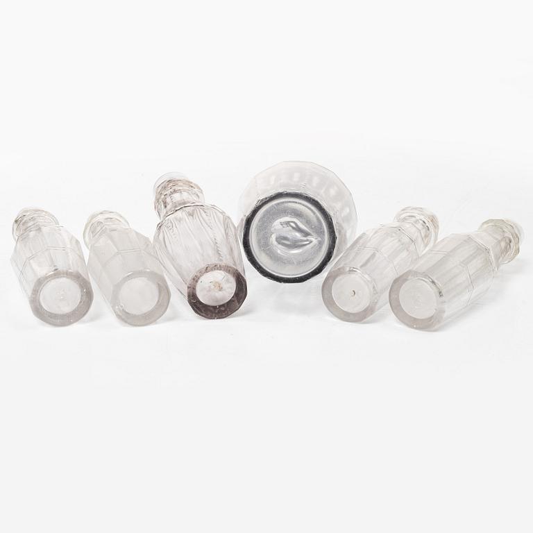 Parts for a table centrepiece, six glass bottles, and seven lids in silver, marked Pehr Zethelius, Stockholm 1807.