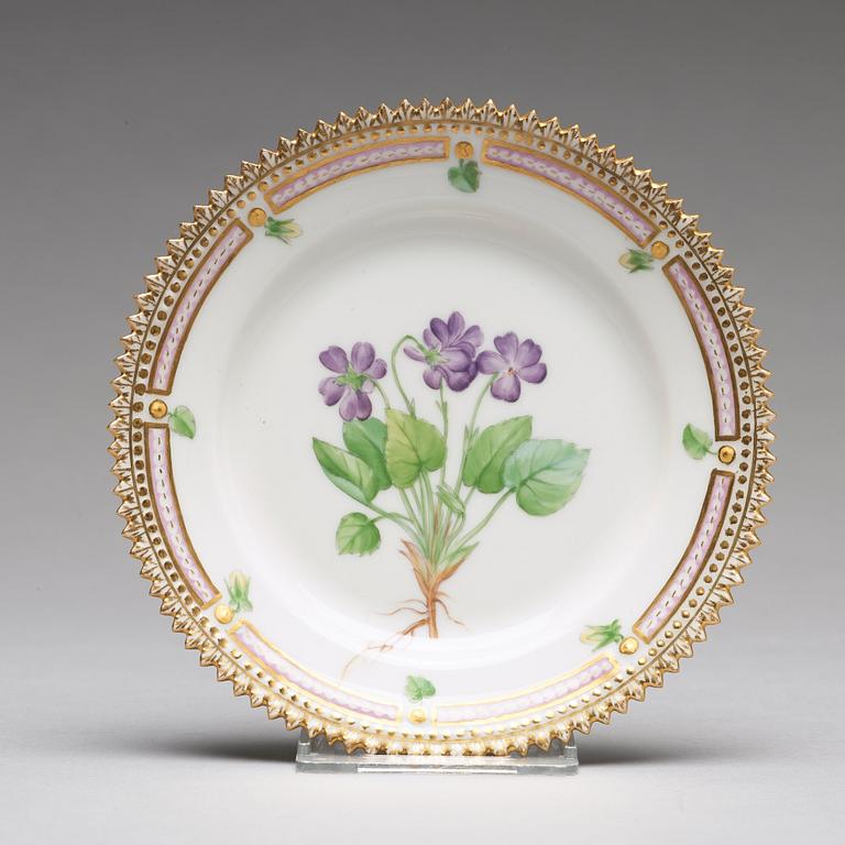 A set of 12 Royal Copenhagen "Flora Danica" bread dishes, Denmark, 20th Century.